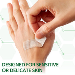 CURAD Truly Ouchless bandage repositioned over a wound for a new seal.