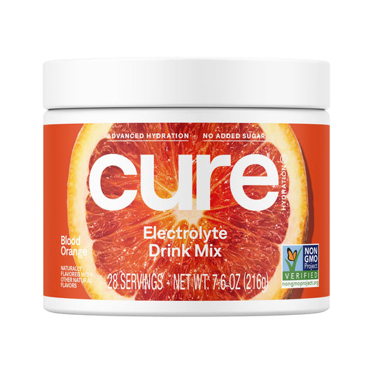 Cure Hydration Blood Orange powder in a jar ready for convenient hydration.