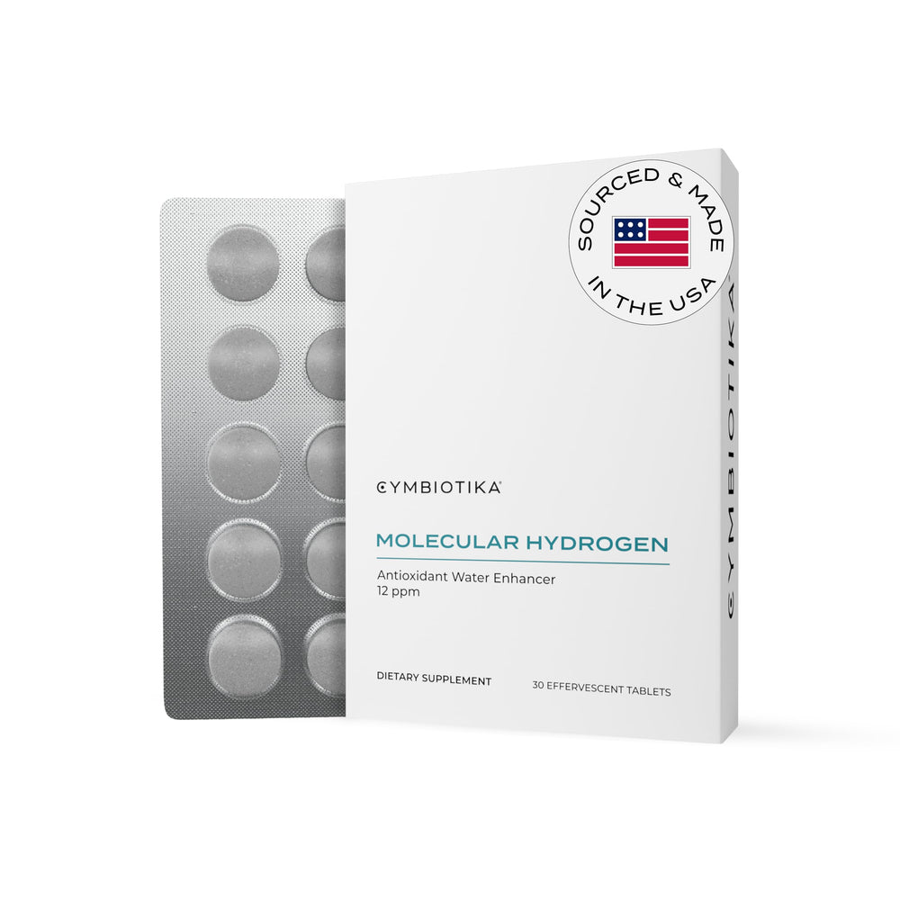 CYMBIOTIKA H2 tablet dissolving in a glass for quick hydration.