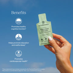 Close-up of Cymbiotika Liposomal Magnesium Complex bottle.