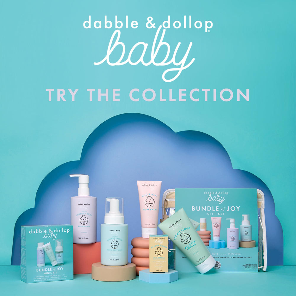 Dabble & Dollop Lullaby Lather bath-time scene showing gentle rinse.