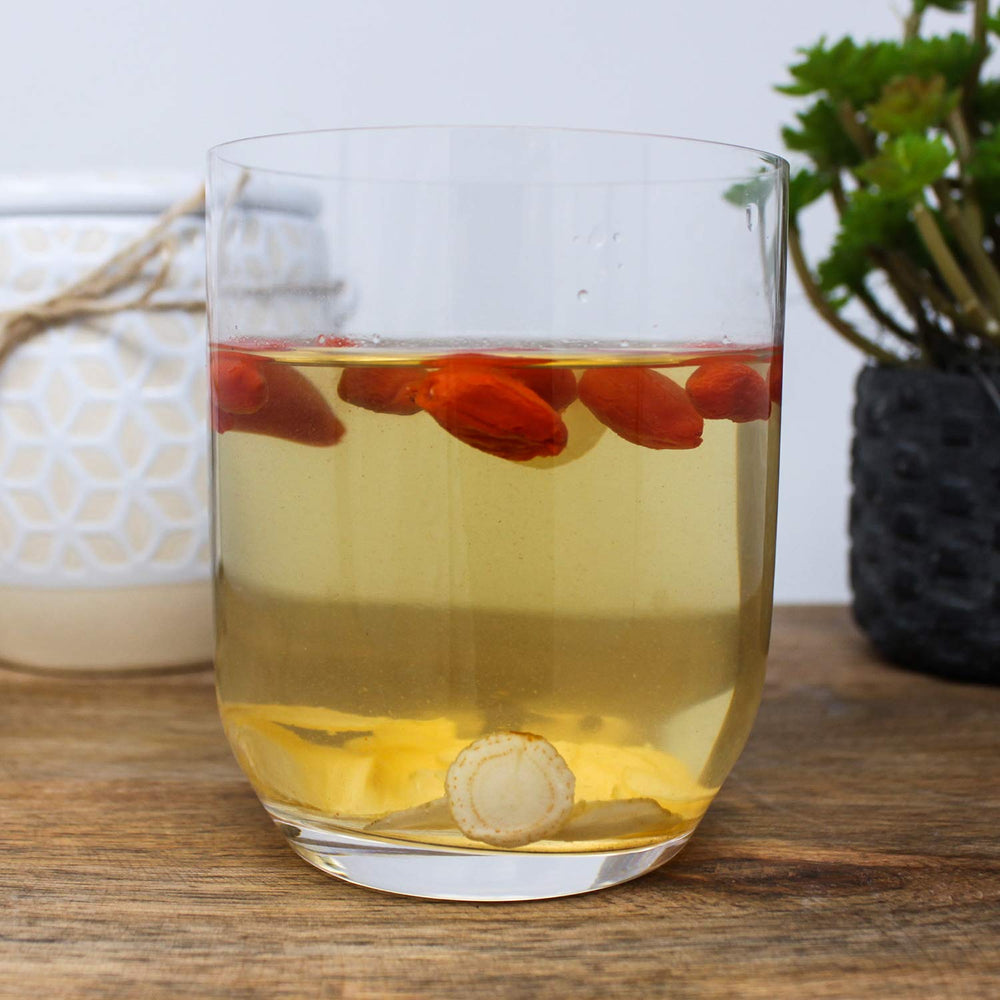 DABC OAK LAND ginseng slices steeped in tea for a gentle lift.