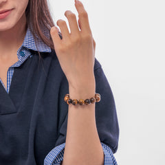 Dare to Mystic Tiger’s Eye Bracelet close-up showing timeless I-XII engravings.
