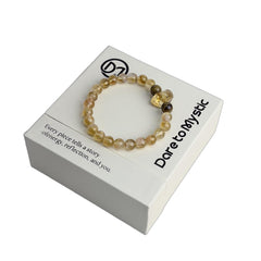 Dare to Mystic tigers-eye bracelet beads show a cat-eye sheen for confident daily wear
