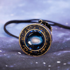 Day Day Up Nebula pendant on adjustable 66 cm rope for versatile wear.