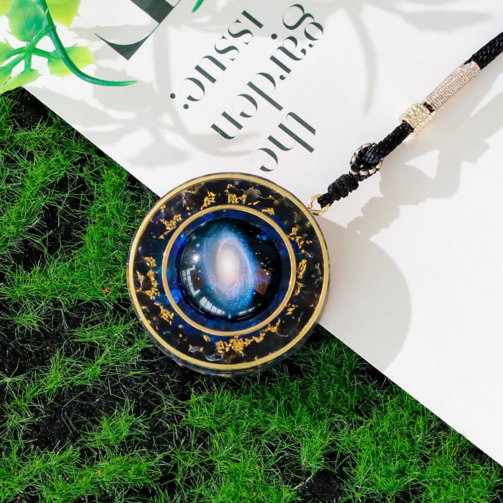 Day Day Up Nebula rotatable pendant with obsidian promotes balance and positive energy.