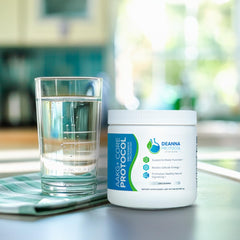 Scoop and bottle of Deanna Protocol AAKG+ Core Powder ready to mix easily.