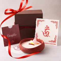 DEEP FLOW Peach Grace candle with rose quartz closeup creates romantic ambiance.