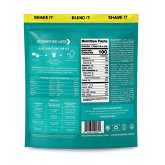 Designer Wellness Angel Cake Vanilla scoop beside powder supporting easy protein measurement.