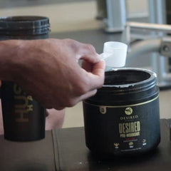 Shaker with Desired Nutrition pre-workout ready for a high-energy training session