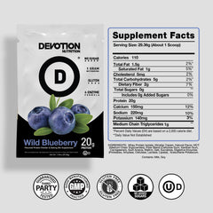 Scoop of Devotion Wild Blueberry powder with a measuring spoon.