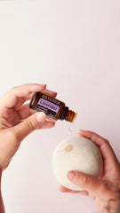 doTERRA Lavender Oil dropper close-up illustrating precise use