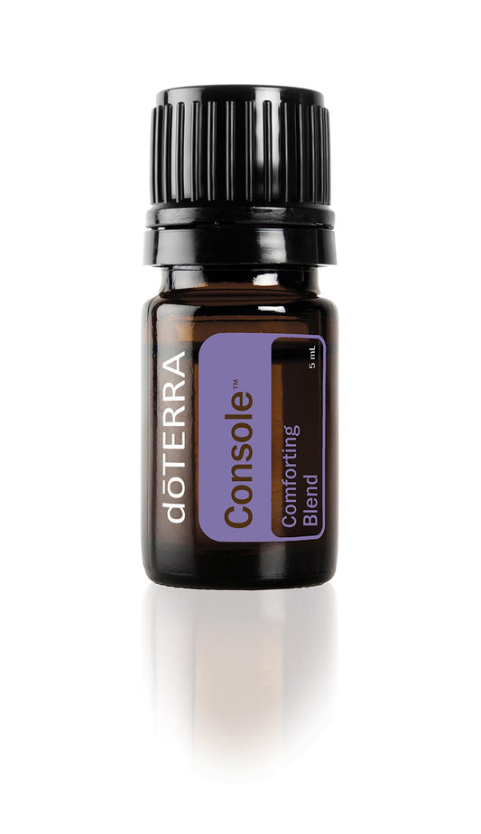 doTERRA Console bottle in amber glass, compact size for easy use and on-the-go calm.