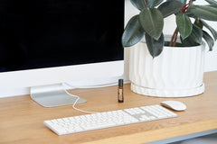 doTERRA Vetiver Touch roller on skin during evening routine.