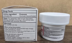 Packaging scene with label highlights Vitamin E ingredient.