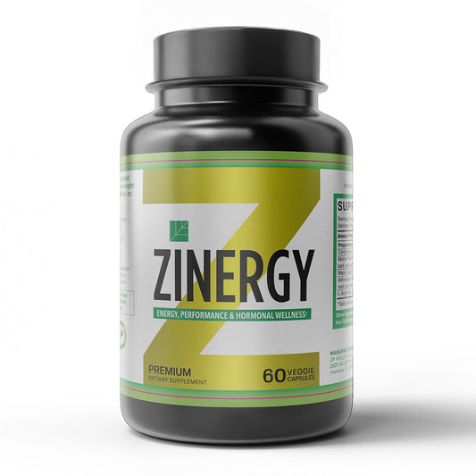 Dr. Zisman Zinergy energy capsules bottle on desk boosts daily vitality.