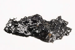 Dragon Herbs High Mountain Shilajit jar with spoon suggests easy mixing.