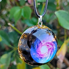 DREMINOVA orgonite necklace worn on chain demonstrates versatile style for daily meditation.