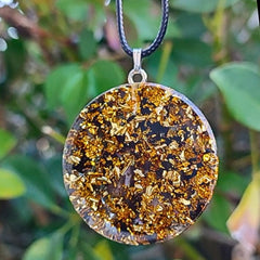 DREMINOVA orgonite pendant handheld conveys portable energy support on the go.