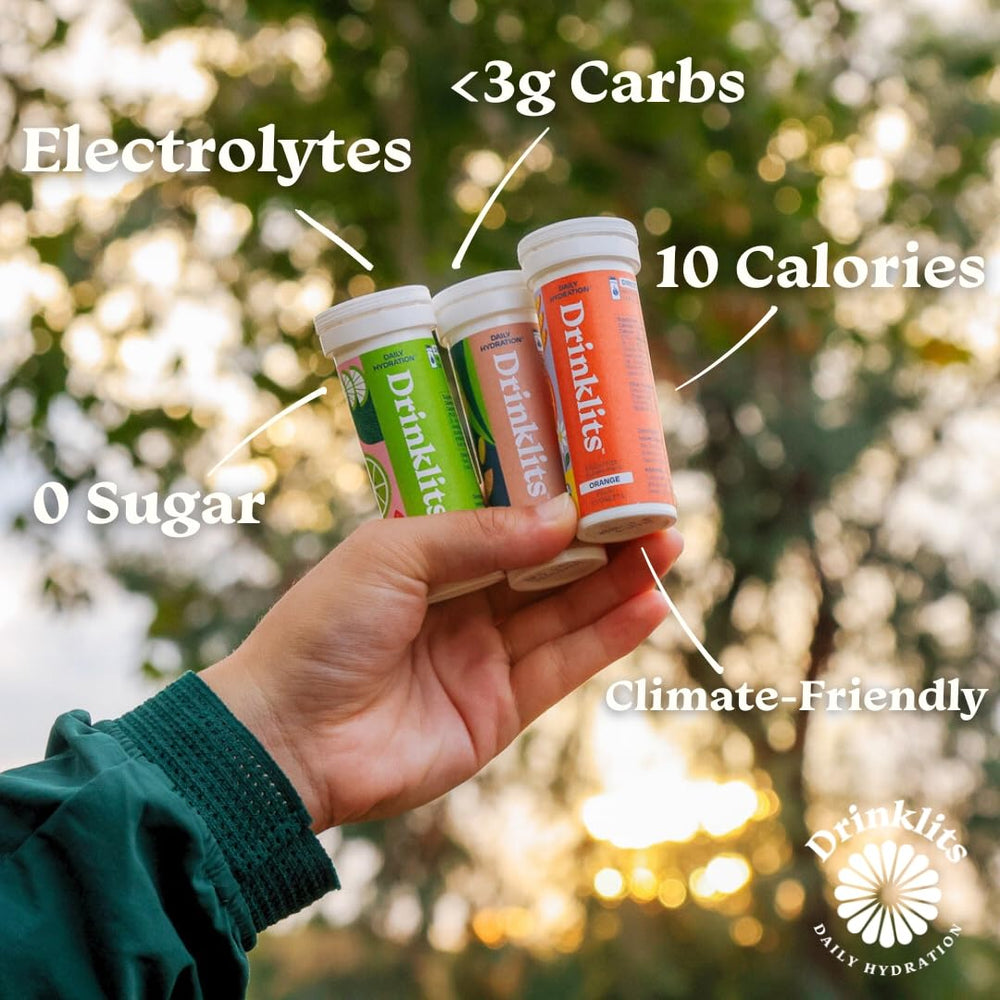 Drinklits Orange tablets tube for refreshing, sugar-free hydration on the go.