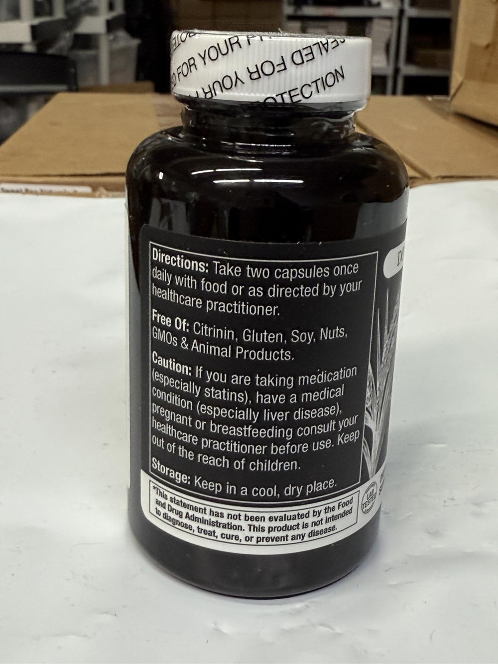 Durable RED Yeast Rice USA-made capsules on display