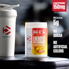 Dymatize Energyze Peach Mango scoop shows easy pre-workout serving.