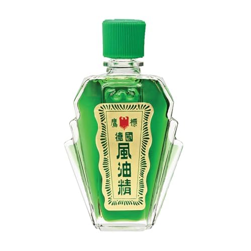 Eagle Brand green bottle close-up highlights natural ingredients and aroma.