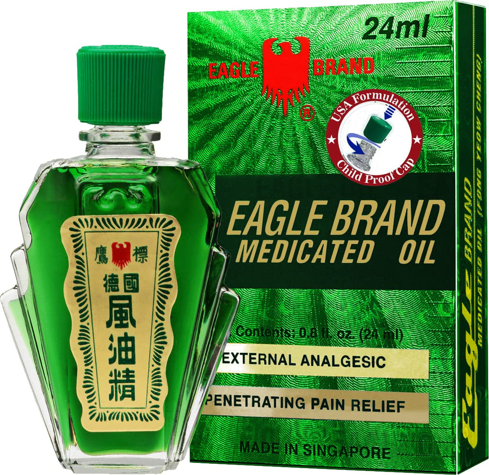 Eagle Brand Medicated Oil bottle front view, highlighting the green color and trusted analgesic use