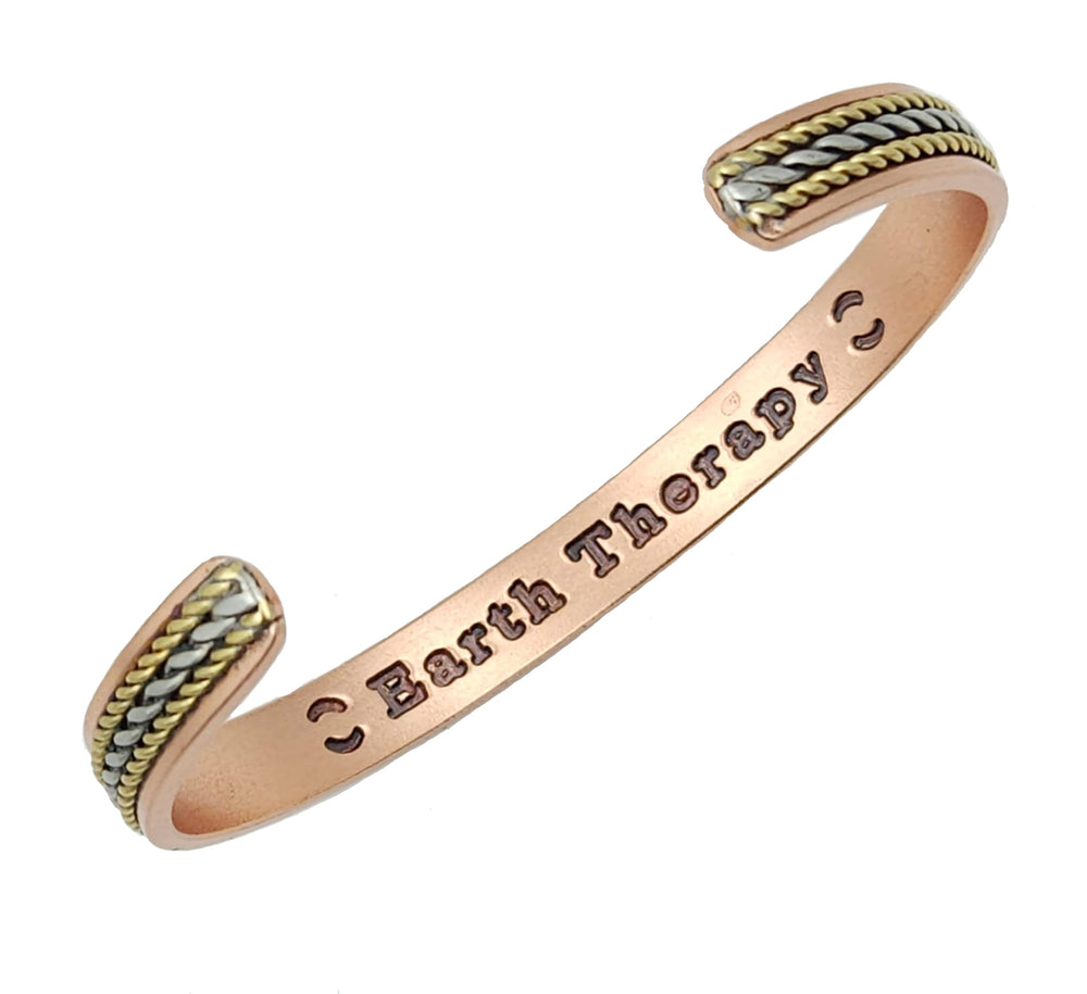 Earth Therapy hammered-copper cuff close-up showing hammered texture for refined style.