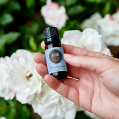 Allure bottle with ingredients, signaling pure high-quality essential oils.