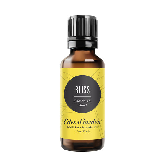 Edens Garden Bliss bottle closeup, pure oil for cozy atmosphere.