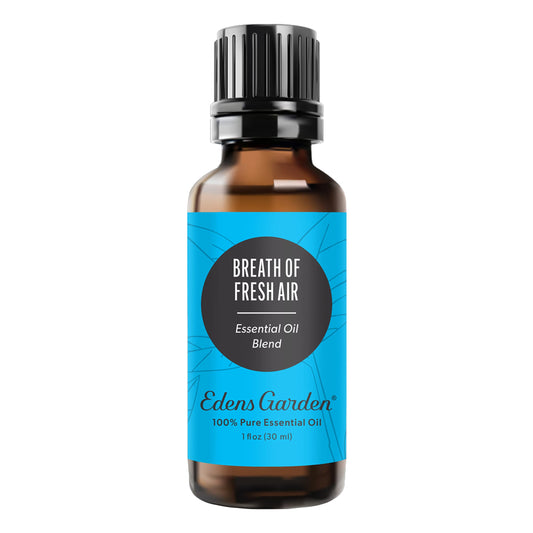 Edens Garden Breath of Fresh Air bottle showcasing citrusy essential oil blend for refreshing spaces.