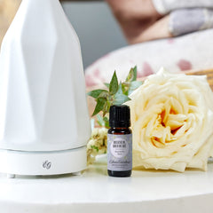 Diffuser setup featuring Edens Garden Breathe In, Breathe Out for calming room aroma.