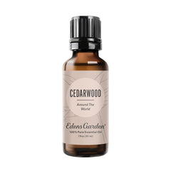 Edens Garden Cedarwood Around The World essential oil bottle for aromatherapy.