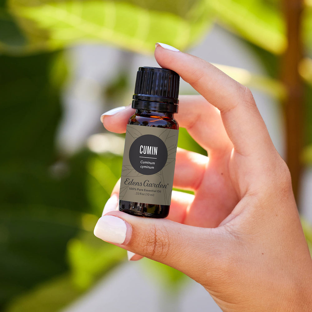 Close-up of Edens Garden cumin oil cap, signaling premium quality.