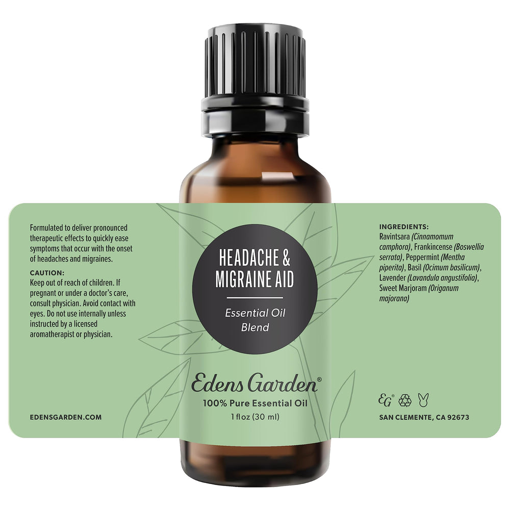 Edens Garden Headache and Migraine Aid bottle diffusing on a desk for refreshed mood.