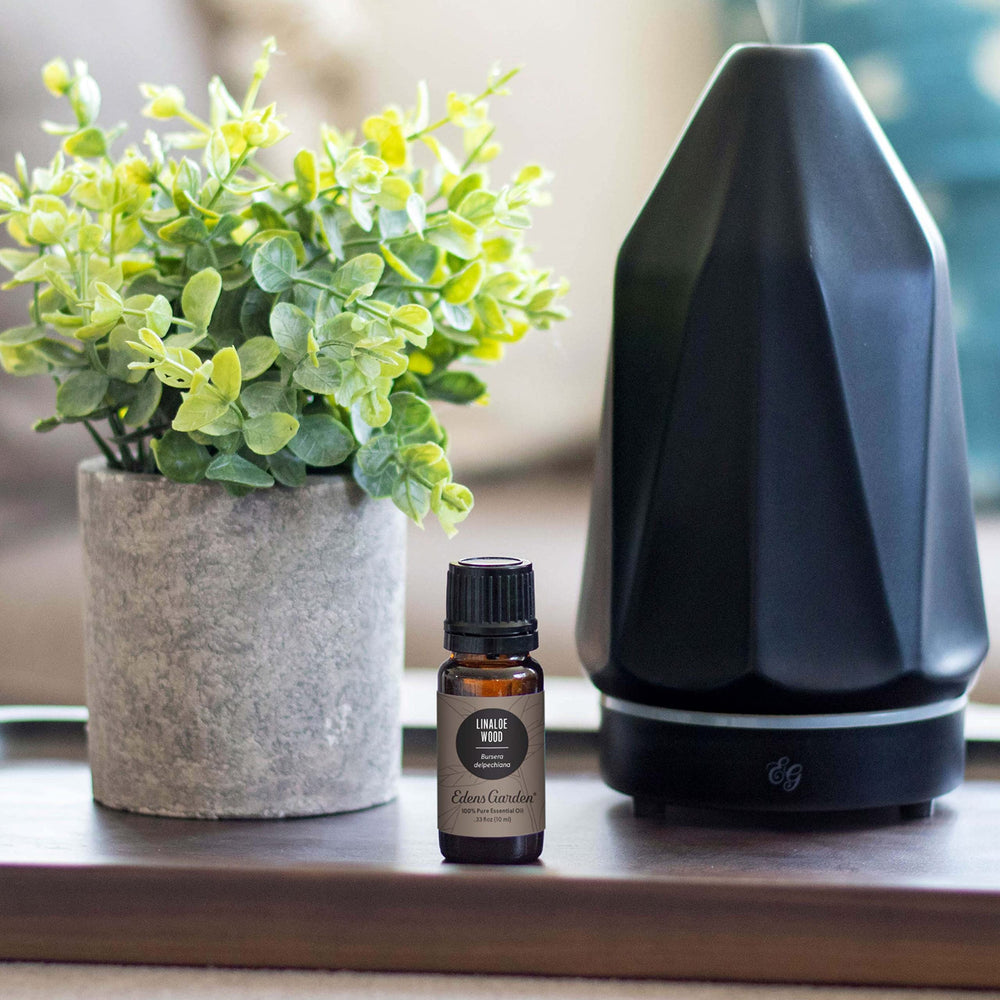 Linaloe Wood diffuser scene for serene workspace with Edens Garden.