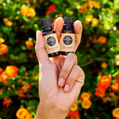 Edens Garden blend label shows Lemon, Ginger, Peppermint notes for uplifting scent.