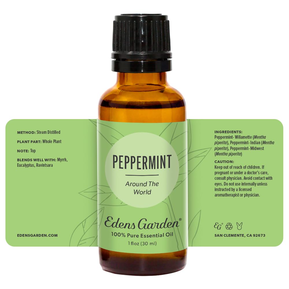 Close up of peppermint leaves and bottle highlights aroma