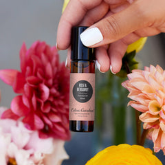 Edens Garden Rose Bergamot Roll-On Cap highlighting easy application