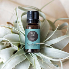Edens Garden Stress-Relief bottle pour shows the pure blend ready to diffuse.