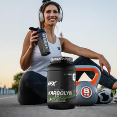 Pouring Karbolyn Fuel from bottle into shaker during training