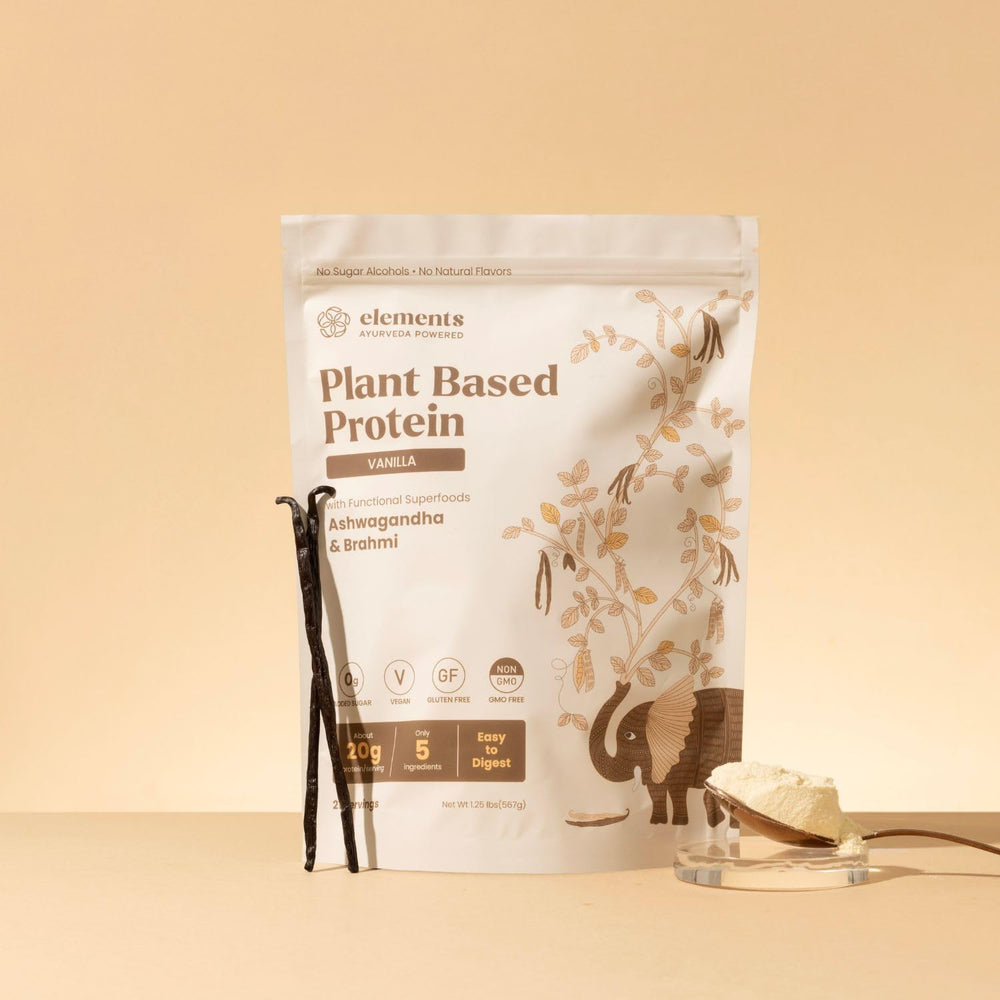 Elements Truffles Vanilla Protein Powder ingredients highlight vegan pea protein and Ayurvedic herbs.