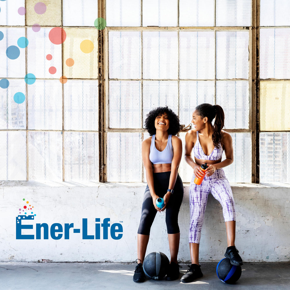 Ener-C sugar-free multivitamin drink mix in a glass with straw demonstrates convenient hydration anywhere.