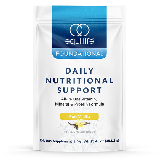 Equilife Daily Nutritional Support vanilla shake in a glass for quick energy and daily nutrition.