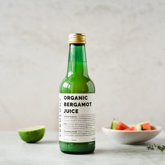 Erbology bergamot juice glass serve depicts refreshing citrus aroma