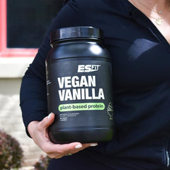 Athlete drinks ES FIT post-workout shake for recovery support.