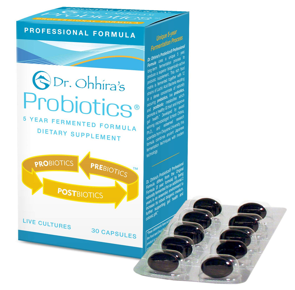 Essential Formulas Dr. Ohhira’s probiotic bottle on desk, highlighting five-year fermentation.