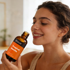ESSLux dryer ball scent vanilla oil for fresh laundry notes.