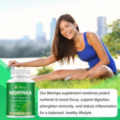 Hand holding Etheray Moringa Capsules bottle for travel use